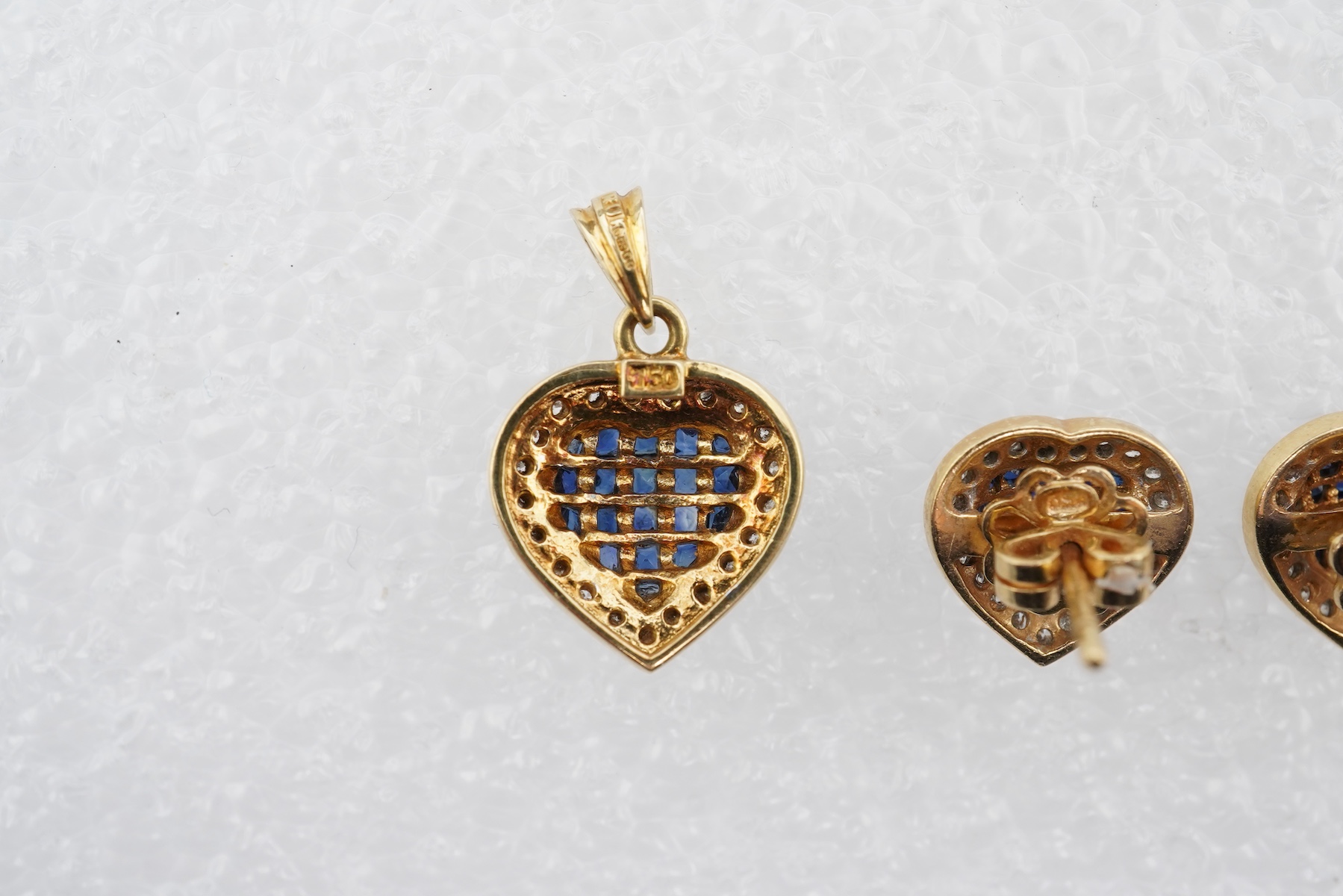 A sapphire and diamond demi-parure